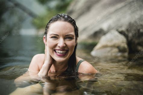 Portrait Smiling Beautiful Woman Swimming In Lake Stock Image F024