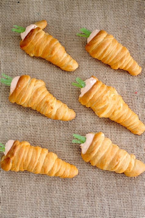 Carrot snack stick are a homemade treat that gets a vegetable in every bite and will replace the store bought stacks you rely on. Carrot Crescent Appetizers Recipe: Fun Twist on Crescent Rolls! | This Mama Loves