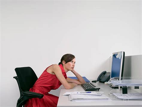 Woman Slouching At Desk Stock Photos Pictures And Royalty Free Images