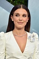 Millie Bobby Brown bares a hint of cleavage in Louis Vuitton at the ...