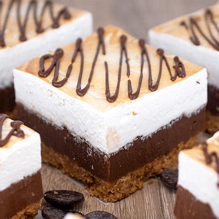 Simply lay out all of your toppings and let guests build their own s'mores. S'mores Fudge Bars with Homemade Marshmallow Topping - Recipe from Yummiest Food Cookbook