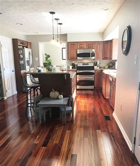 Painting your kitchen cabinets is the single most transformative thing you can do to your kitchen without a gut renovation. Cherry Wood Cabinets With Cherrywood Floors Benjamin Moore ...