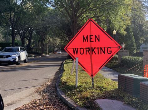 Local Artist Replacing “men Working” Signs With Gender Neutral