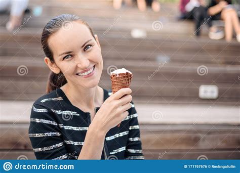 Caucasian Brunette Woman With Ice Cream On Bench In Fresh Air Stock Photo Image Of People