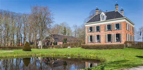 Panorama Of The Historic Mansion Ennemaborg And Pond In Midwolda Stock