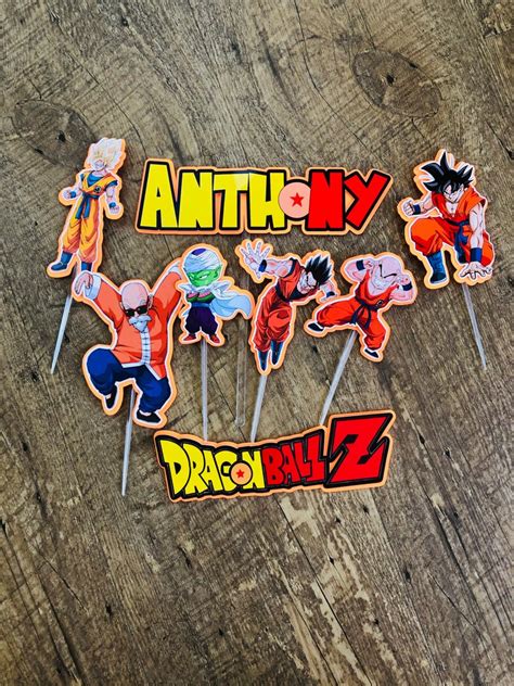 Very decorative individually designed and cut 300 gsm glitter card in various colors cake toppers are supplied with 1/2 food grade skewers and sticky dots unattached. Personalized Dragon Ball Z Cake Topper - Betty Personalized