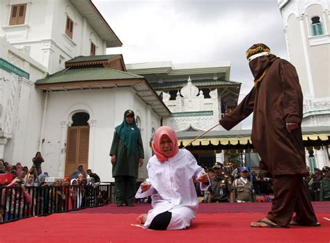 60 year old christian woman caned for selling alcohol in unprecedented sharia law case the
