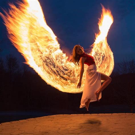 Beautiful Light Painting Photos Of A Young Woman Rising From The Ashes