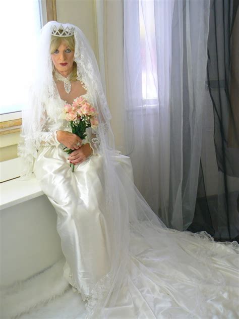 stunning crossdresser bride april daynes wore a flawless satin wedding gown in 2010 she is a