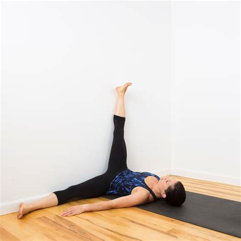 1 Leg Up The Wall Relaxing Wall Yoga Sequence POPSUGAR Fitness Photo 3