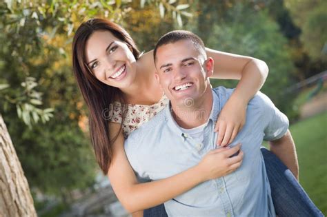Mixed Race Romantic Couple Portrait In The Park Stock Photo Image Of