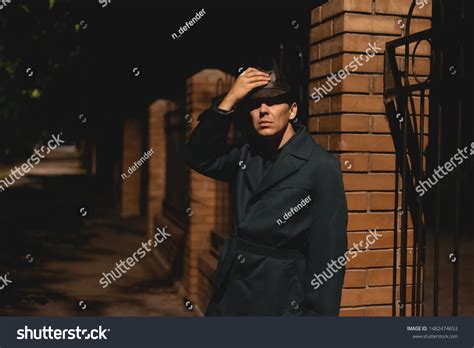 Serious Detective Agent Hiding His Face Stock Photo 1482474653