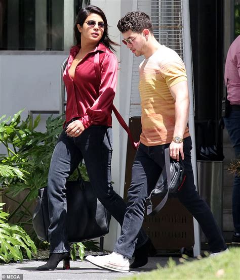 Priyanka Chopra Looks Relaxed In A Loose Fitting Red Blouse Daily Mail Online