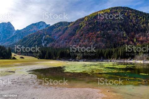 Beautiful Lago Di Fusine Mountain Lake In The Autumn And Mangart