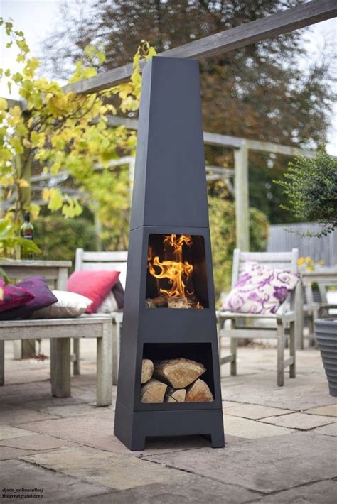Featuring a stylish wood grain printed resin hearth, this fire pit is complete with an attractive oil rubbed bronze finish steel base, making it the perfect centerpiece for your outdoor living space. Chiminea Outdoor Fireplace Fire Pits Chimney Patio ...