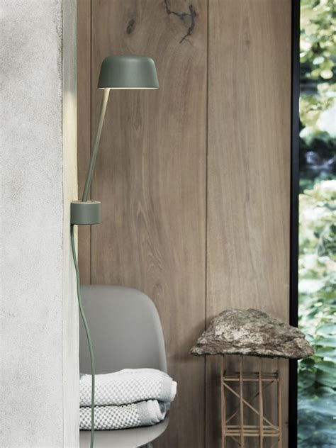 The wood lamp is the epitome of simplicity and offers a new interpretation of the traditional architect lamp. LEAN wall lamp designed by Claesson Koivisto Rune for ...