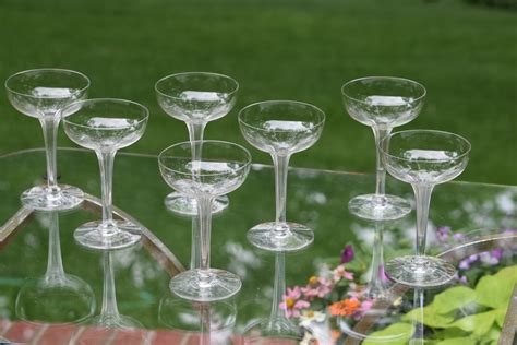 vintage crystal hollow stem champagne coupes set of 7 central glass works circa 1940 s