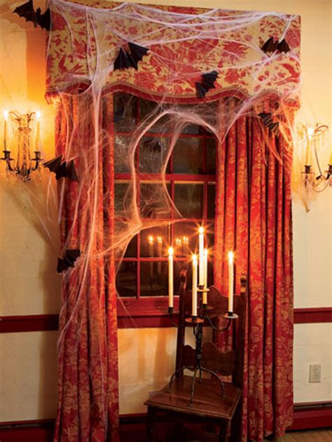 Here are the halloween home decorations we have found that you can look into wall paper of gray stones was used where halloween decors were mounted to make the living room look creepy. Halloween Window Decorations Ideas to Spook up Your Neighbors