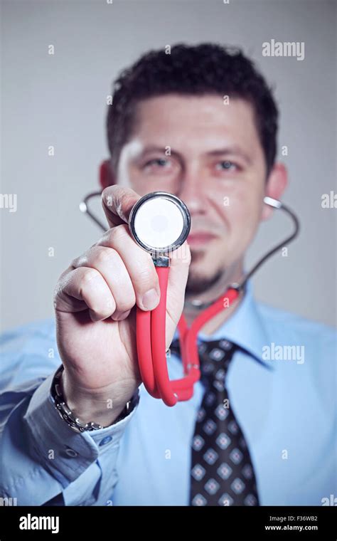 Doctor Holding Red Stethoscope Stock Photo Alamy