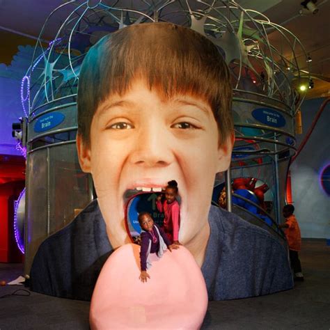 A Childs Face Is Shown With An Object In Front Of Him