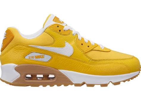 The pair shares design cues with its counterparts, most notably the exposed stitching and bold swoosh. Nike Air Max 90 Tour Yellow Gum (W) - 896497-701