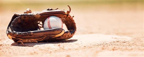 Baseball Field Softball And Ball Glove And Base Plate On Pitch Ground