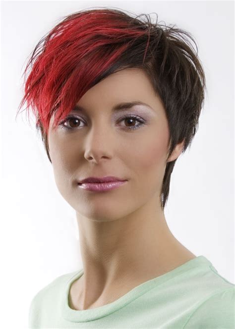 Funky And Steeply Tapered Short Hairstyle With A Red Shock