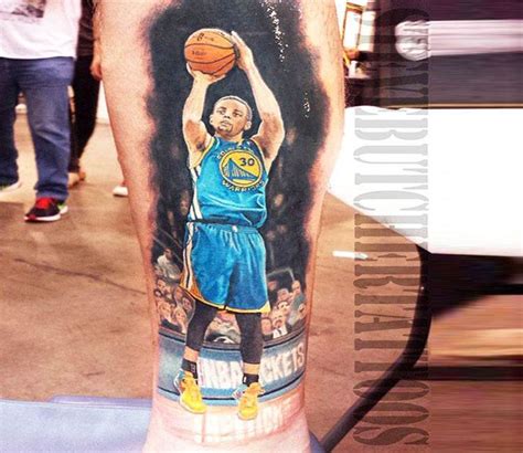 A Man With A Basketball Tattoo On His Leg