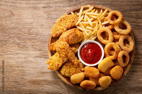 Foto De Fast Food Meals Onion Rings French Fries Chicken Nuggets