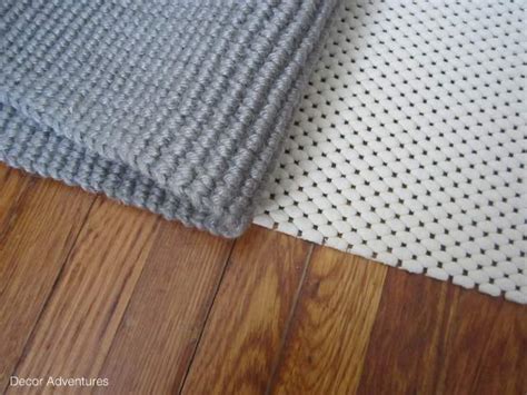 Our 9×12 area rug looked more like a wall to wall carpet, covering nearly every inch of our floor. Why You Should Use a Rug Pad » Decor Adventures