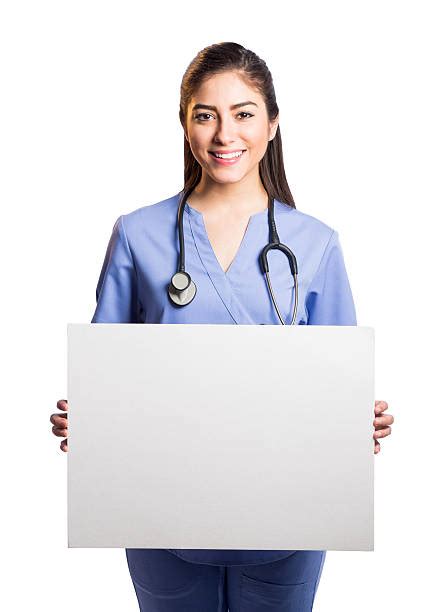 Best Female Nurse Holding A Sign Stock Photos Pictures And Royalty Free