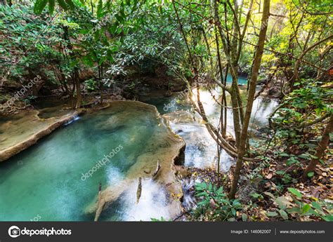 Beautiful Waterfall In Rainforest Stock Photo By ©kamchatka 146062007