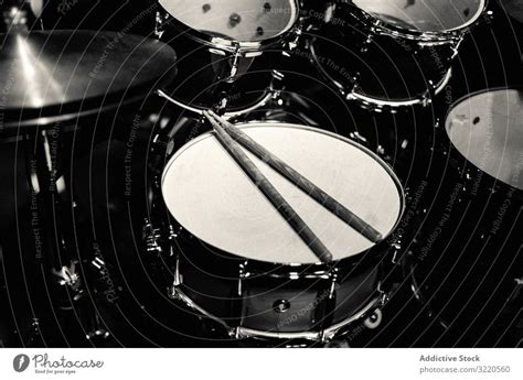 Drum Set On Stage In Blue Neon Spotlights A Royalty Free Stock Photo