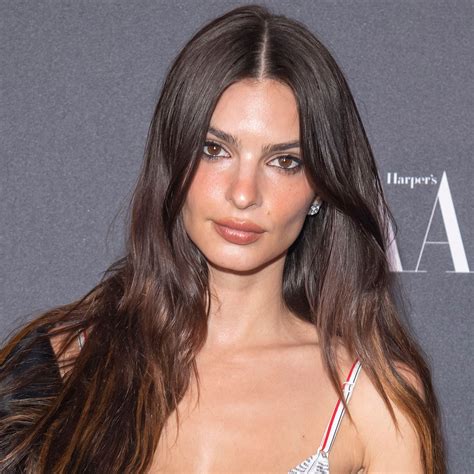 Emily Ratajkowski Flashes Her Incredible Legs In A High Slit Leather