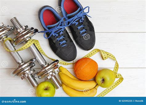 Fitness Equipment And Healthy Nutrition On White Wooden Fl Stock Image