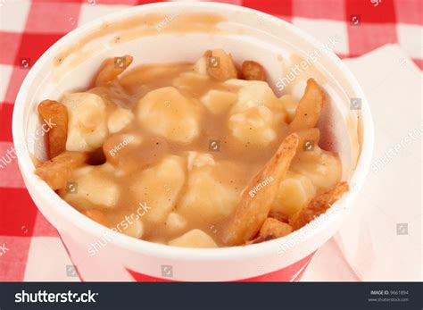 French Fries Smothered In Gravy And Melted Cheese Also Known As