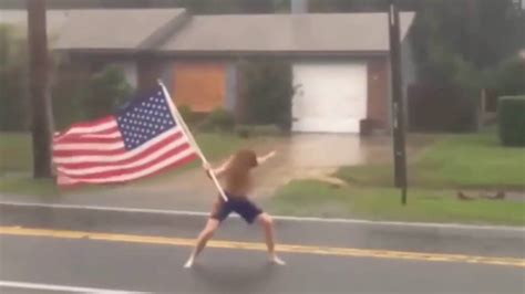 Florida Crazy Man Challenges Hurricane Matthew With American Flag In Hand Youtube