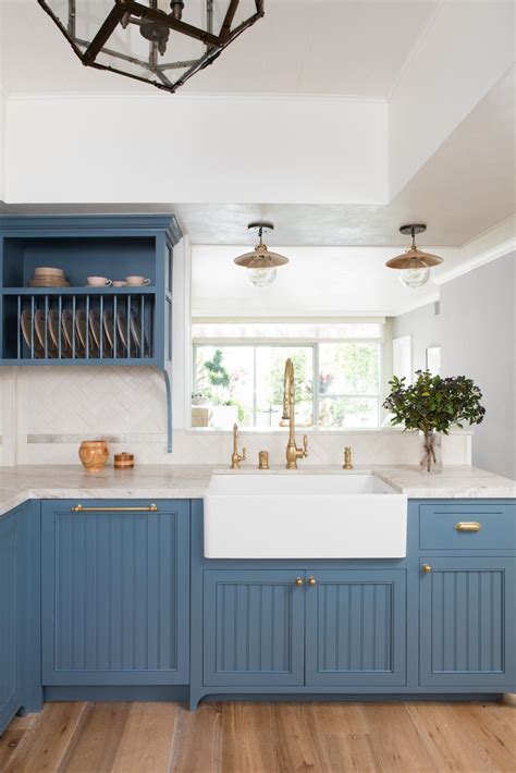 However, dark colors like black do not work well in a kitchen set that has white cabinets. Bright White Kitchen With Blue Cabinets | HGTV