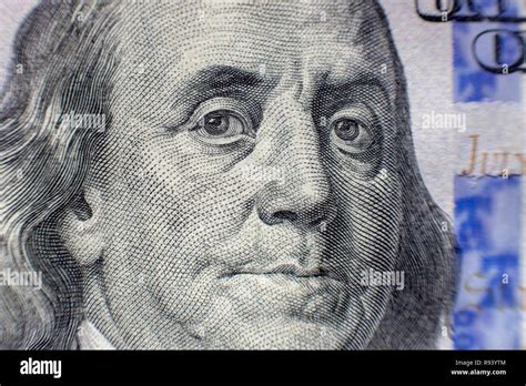 Benjamin Franklin Face On Us One Hundred Dollar Bill Macro Isolated