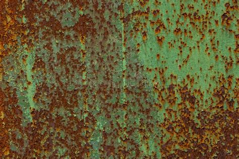 Peeled Off Green Paint On Flat Rusted Sheet Metal Surface Stock Image