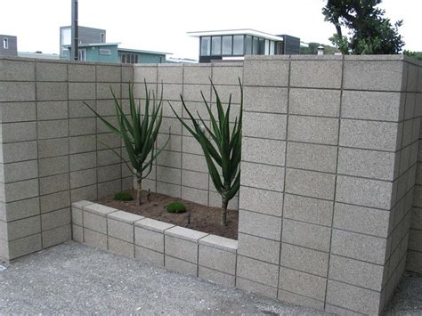 Easily picked up at your local home improvement store, with a little creativity you can use it to create garden hardscaping that will last. cinder block facade - Google Search | Concrete block walls ...