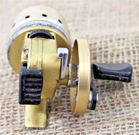 Daiwa Minicast Gold Ultra Light Spincasting Fishing Reel Ultralite