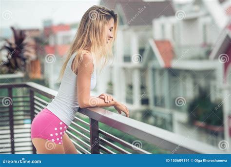 A Cute Beauty On The Balcony Telegraph