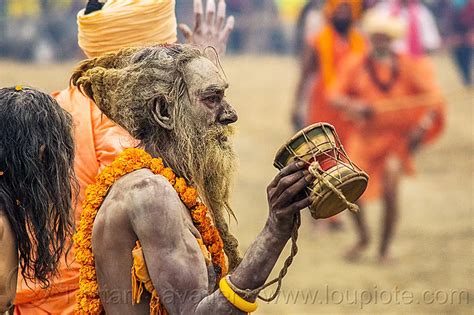 Naga Sadhu Hindu Devotee With Ritual Drum Kumbh Mela India