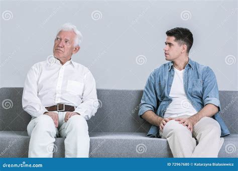 Intergenerational Conflict Between Father And Son Stock Photo Image