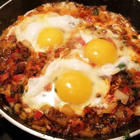 Eggs And Chorizo With Onion Tomato Cilantro And A Serrano Chorizo And