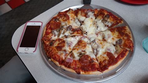 How big is a small dominos pizza? You can see how big their small 10 inch pizza is next to ...