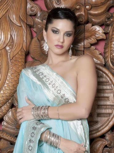 Sunny Leone Shows Her Breasts Cleavage In Blouseless Half Saree Stills