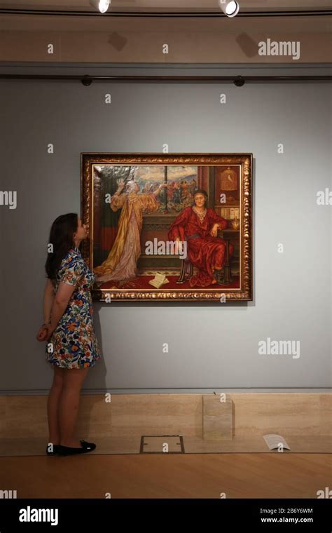 A Gallery Assistant Views The Gilded Cage By Artist Evelyn De Morgan