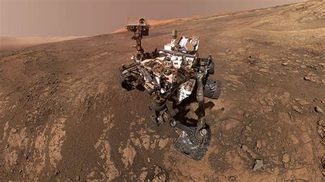 The base of mars' mount sharp is pictured in this nasa handout photo taken by the curiosity rover. NASA's Curiosity rover switches 'brains' temporarily to ...